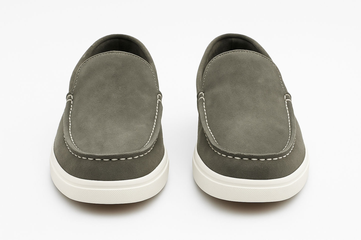 Pair of gray loafers on a white background