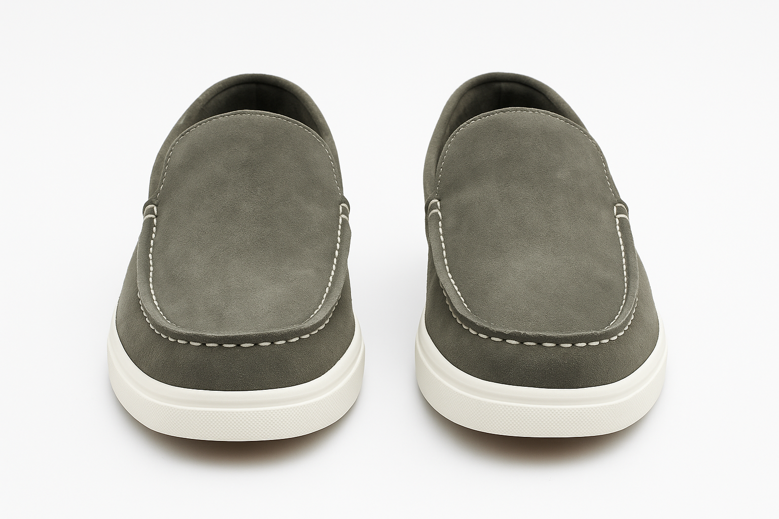Pair of gray loafers on a white background
